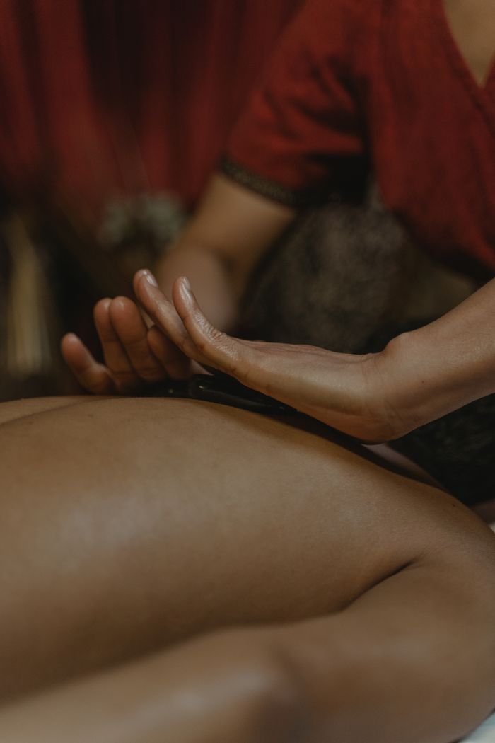 gallery-5 Experience therapeutic relaxation with a professional massage therapy session captured in a close-up view.